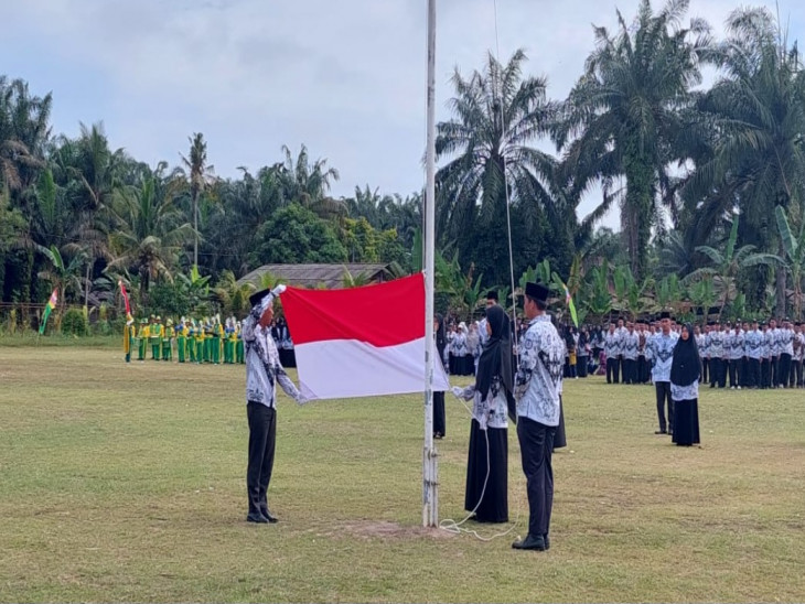 PC PGRI Tapung Hilir Laksanakan Upacara Bendera Dalam Rangka HUT PGRI ke 78 dan HGN Tahun 2023